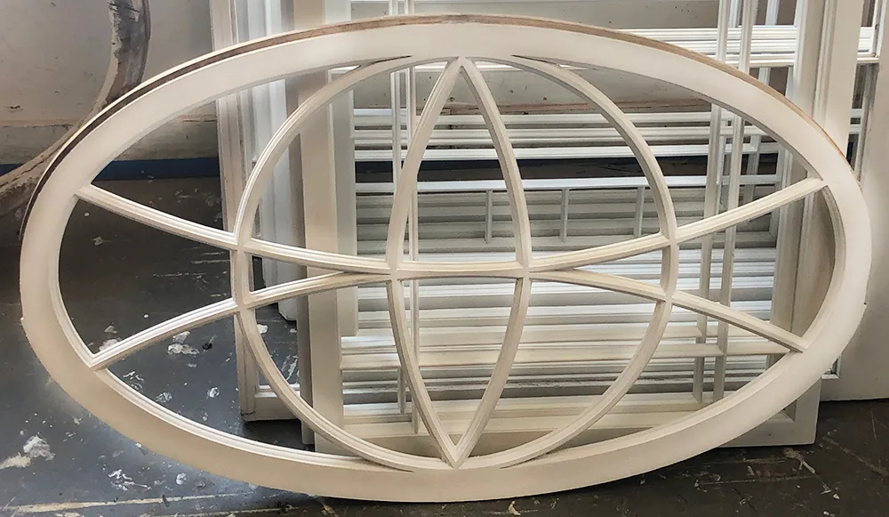 white oval custom window frame
