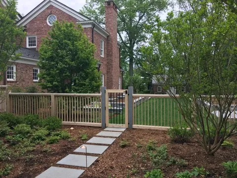 wood fence with outdoor shower enclosure and privacy design in Rye NY