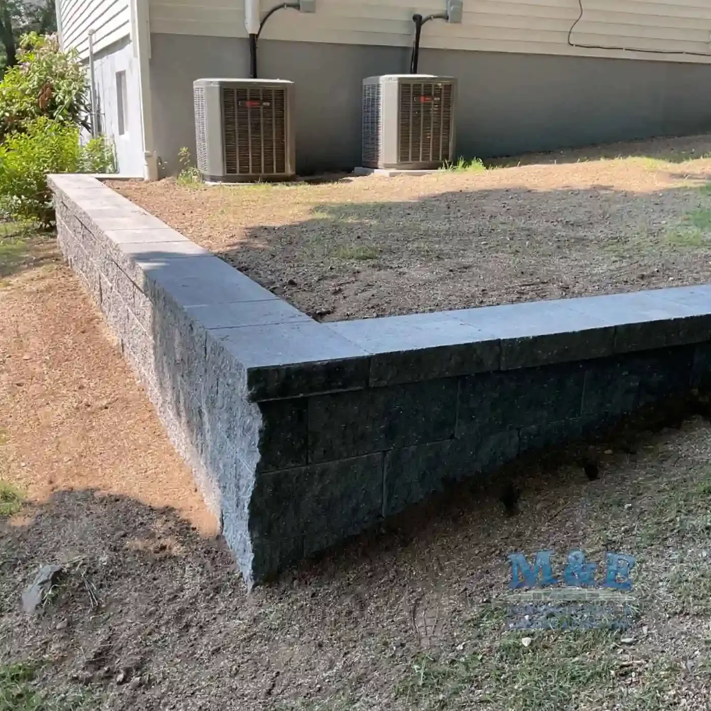 Retaining wall rebuilt