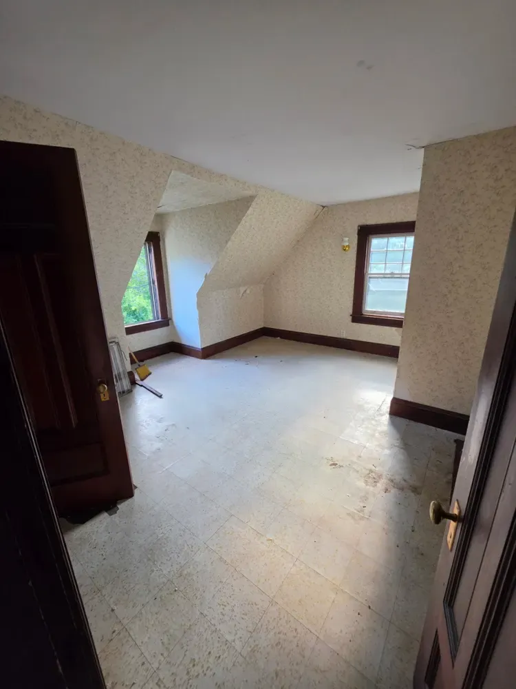 The same upstairs room empty after the mattress was removed