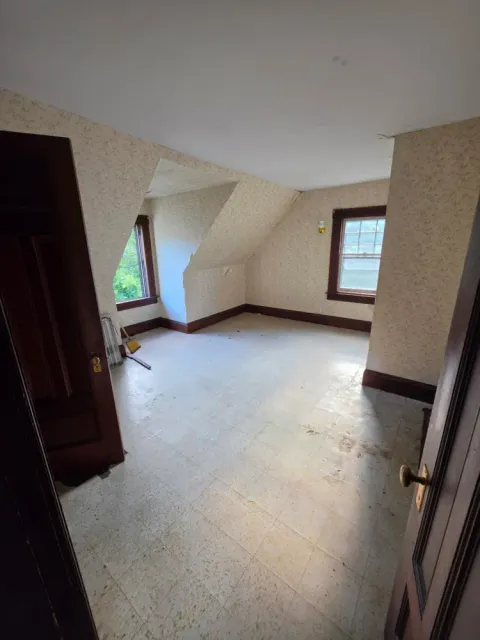 The same upstairs room empty after the mattress was removed