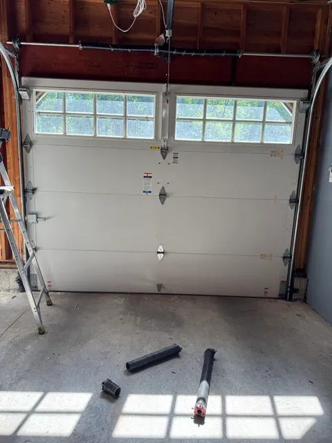 Garage door torsion spring replacement in Newington CT