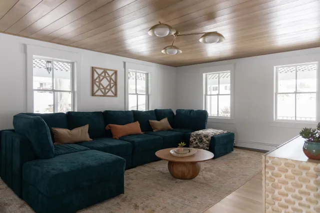 Living room with painted shiplap ceiling