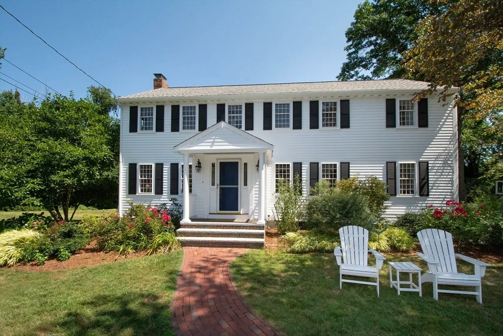 Spacious center entrance Colonial set on over 1/2 acre lot in one of Cohasset's most desirable neighborhoods known for its block parties and holiday festivities. This home has been thoughtfully expanded and updated by its long time current owners. A welcoming foyer is flanked by the formal living room with fireplace and dining room with wainscoting detail. The heart of the home is the beautifully designed chef's kitchen featuring ample cabinetry and counter space, high-end stainless appliances including a Thermador dual fuel range and separate wall oven, a spacious dining area and den separated by pocket doors. All flows seamlessly into a light filled family room with cathedral ceilings, custom built-ins and a wall of windows overlooking the Gunite pool with salt generator. A slider out to a large screened porch with mahogany decking provides relaxing outdoor living space. The second level offers 4 bedrooms including a sunny primary suite with cathedral ceilings and skylight, 3 closets and updated bath. There are hardwood floors throughout the first level and hardwood floors under the carpet in 3 of the bedrooms on the second level. The finished lower level offers additional flexible space with a mud room entry from the 2 car garage, a home office alcove, laundry room and a large bonus room ideal for a home gym or play room. Some recent updates include interior and exterior painting (2026), a whole house Generac Generator (2022), new gas furnace & water heater (2020), roof (2021), kitchen appliances (2021). This home provides the perfect space for entertaining family and friends. The neighborhood offers easy access to the commuter rail and is also close to shopping, parks, restaurants, Sandy Beach and Cohasset Village. This inviting home is a must see in order to appreciate all that it has to offer!