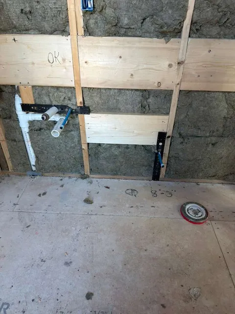 Bathroom rough plumbing for sink and toilet installation