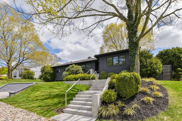 Completed modern home exterior and landscaping