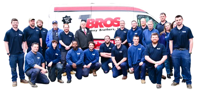 Trethewey Brothers plumbing and heating team standing in front of company truck