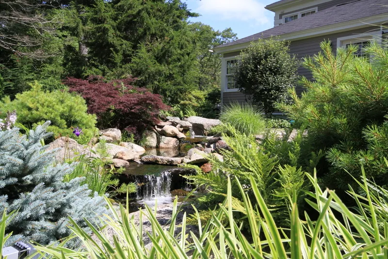 Naturalistic pool waterfall