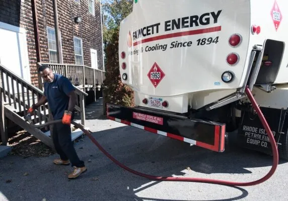 Fawcett Energy driver and heating oil delivery truck