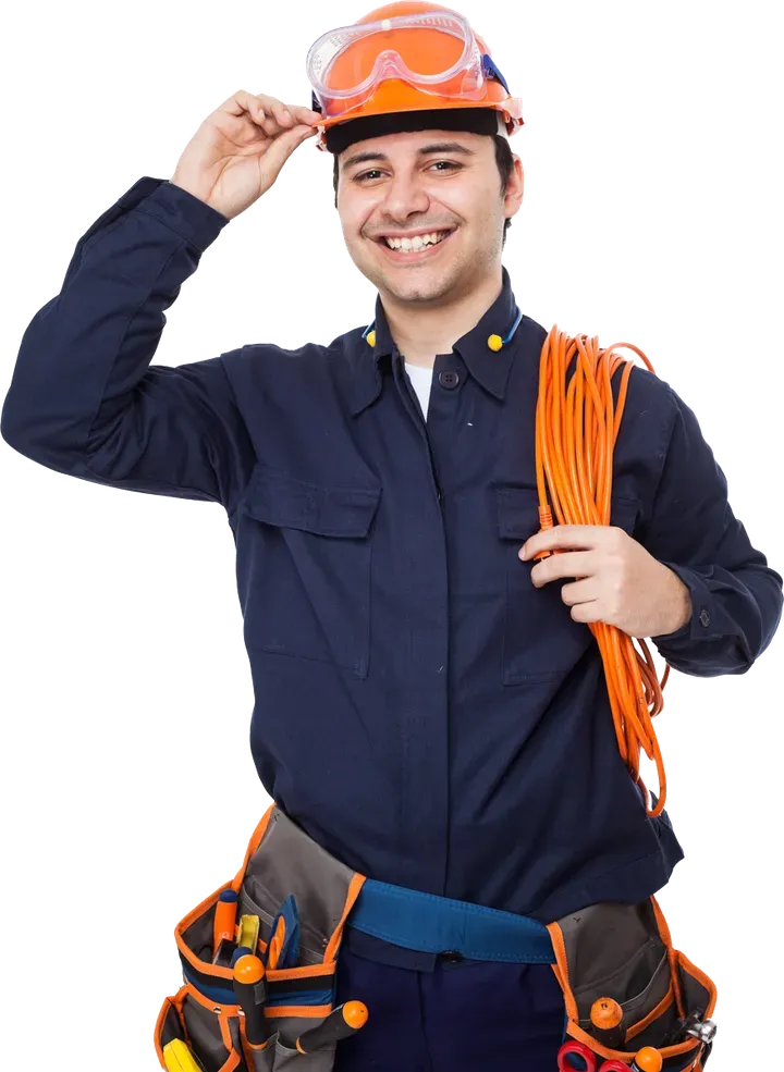 Smiling electrician in blue uniform, holding orange wire and touching his hard hat.