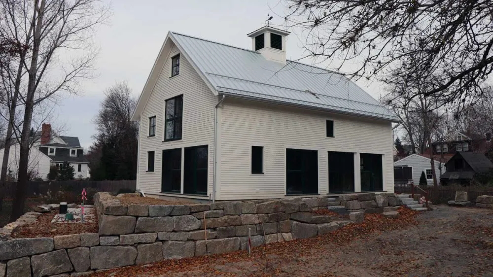 Joset converted an existing Ipswich barn to residential use with a super insulated exterior shell and high performance windows and doors.
