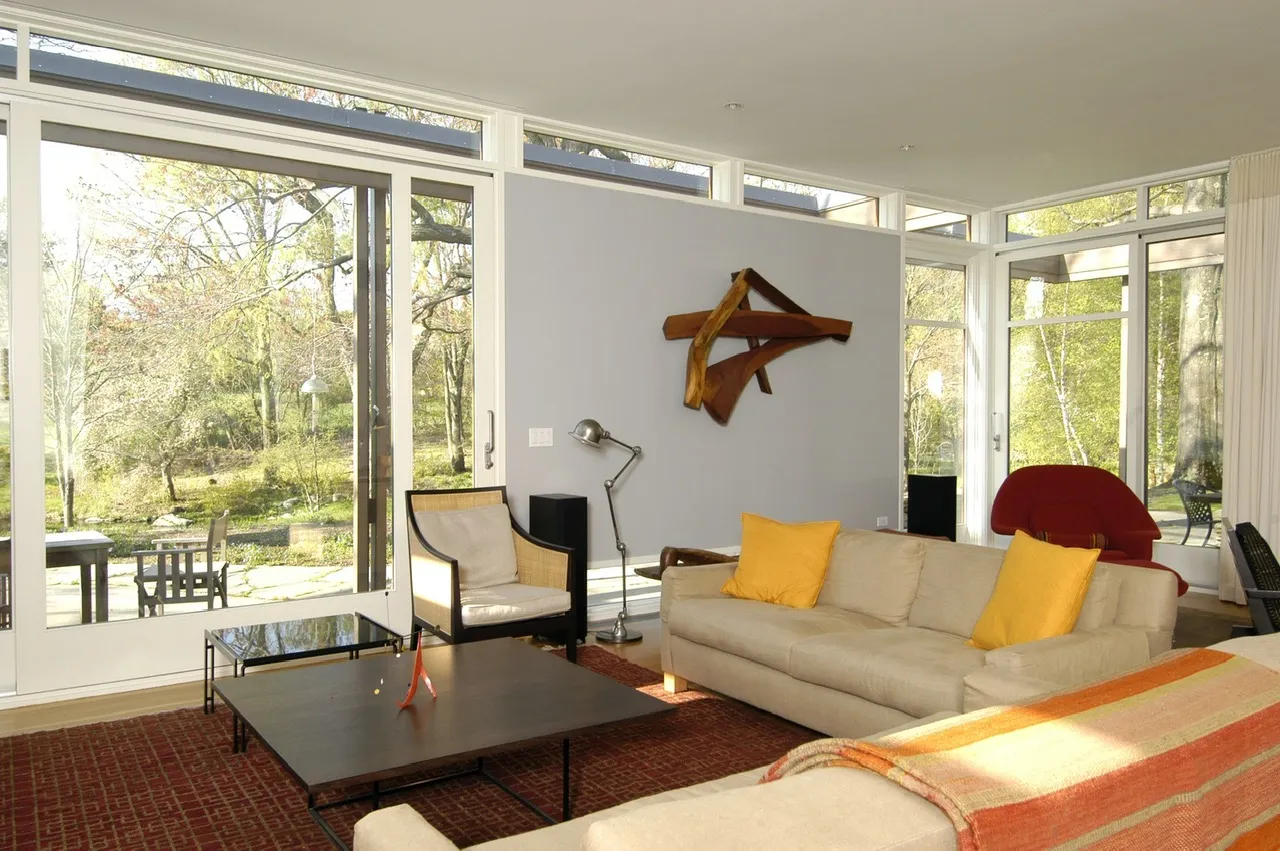 Open living room with floor-to-ceiling glazing