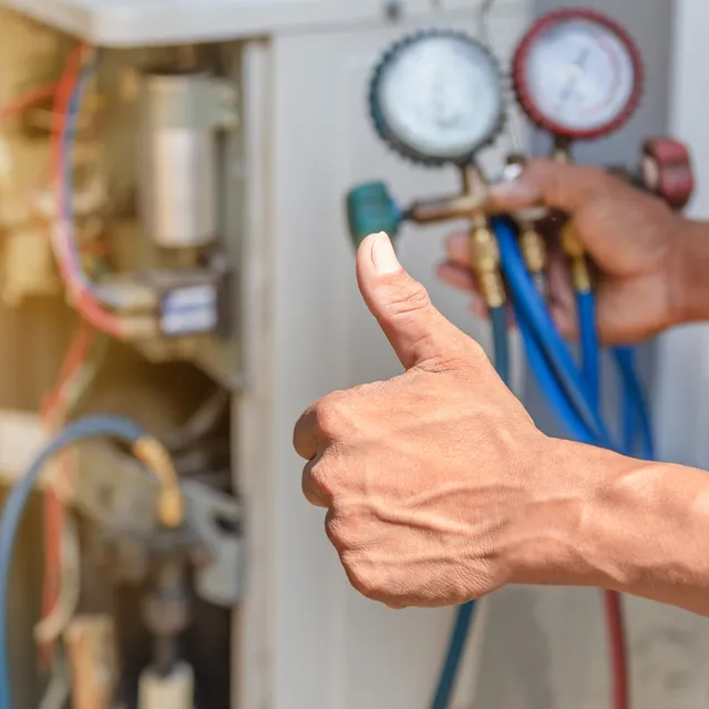 Man Checking AC Pressure