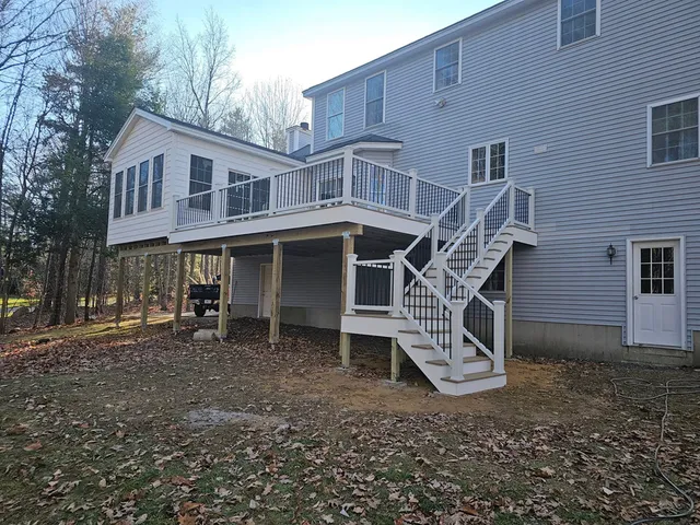 Completed rear addition with elevated deck and stairs