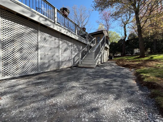 Processed-gravel base installed and compacted during Bellingham Massachusetts patio project