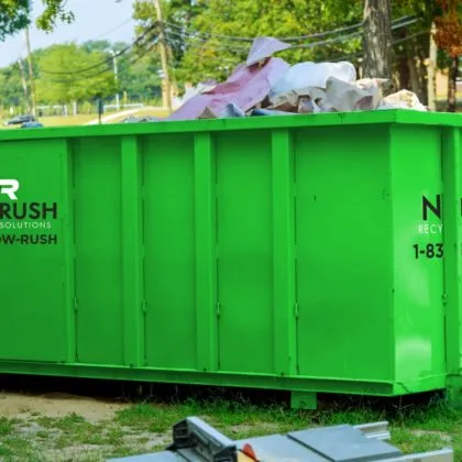 Residential Dumpster full of Household Debris