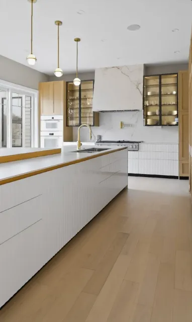 Light oak DOCA kitchen with a stone island