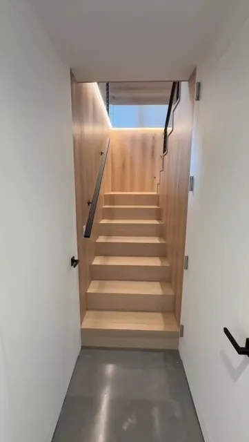 We’ve had a lot of interest in the staircase and the integrated lighting detail, so we put together a closer look. The combination of white oak treads and risers with the continuous recessed LED channel not only highlights the wall paneling but also creates a clean shadow line that elevates the overall design. Using natural wood tones allows the space to feel warm and inviting, while the precision in detailing ensures a refined modern finish. Excited to share the completed result — we’d love to hear your thoughts. Thanks for looking!!!

Finish carpentry by @ward_construction_cape_cod 

#smithfieldbuild #echelonbuilders #interiorfinish #luxuryhomes #custombuild #millwork #architecture #interiordetails #customstairs

#handmade #architecturalmillwork #custominteriors #finecraftsmanship #LuxuryHomes #oakceiling #finewoodworking #handmade #gobuild #woodceiling #finewoodworking #finehomebuilding  #customkitchen #CustomCabinets #oakpaneling #whiteoak