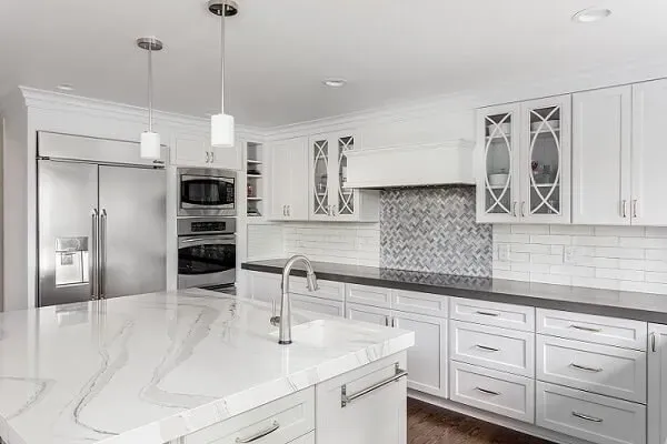 Gorgeous White Kitchen Cabinets Gray Backsplash Black Countertops - ProTEK Painters Needham