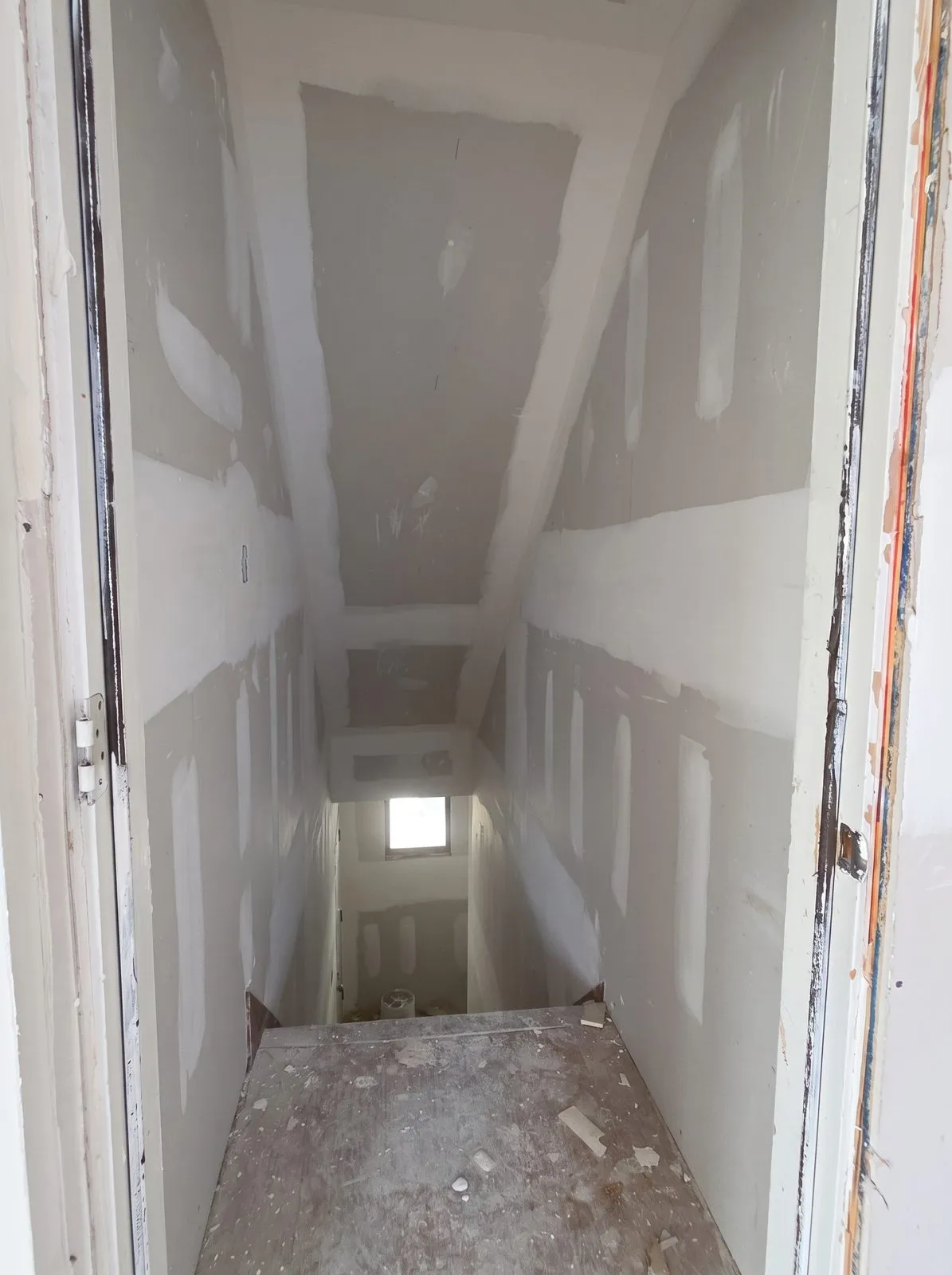 Stairwell taped and ready for paint