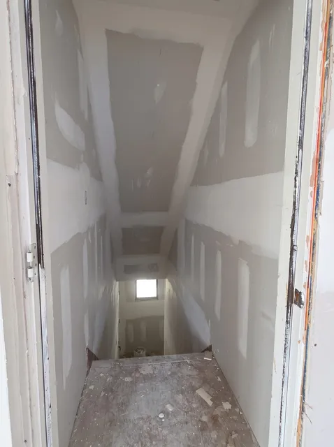 Stairwell taped and ready for paint