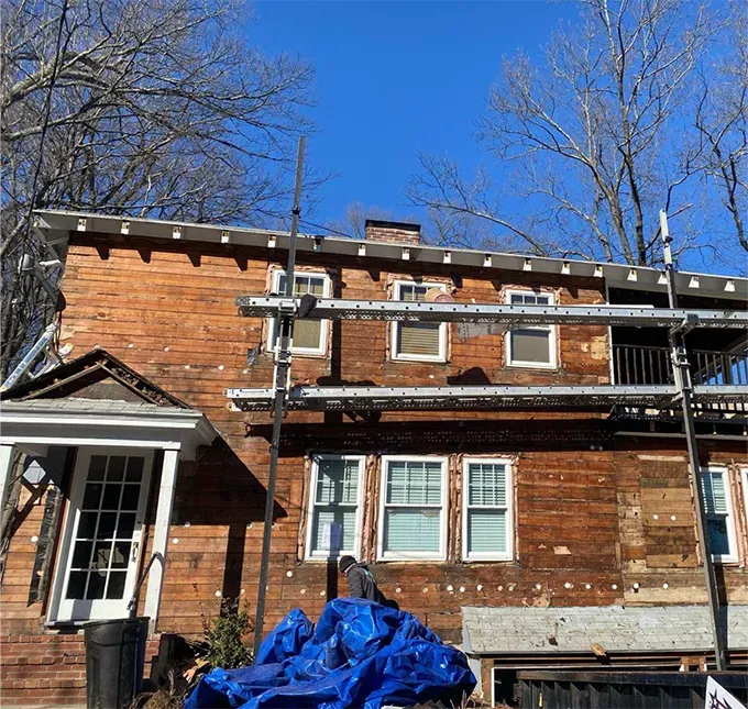 Newton Massachusetts home before siding and roof replacement
