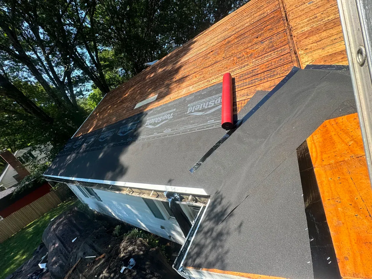 Finished asphalt shingle roof on a residential home