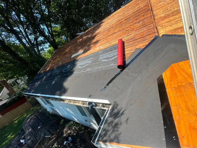 Finished asphalt shingle roof on a residential home