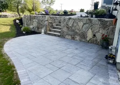 Completed patio installation Johnston RI by Reyes Landscaping