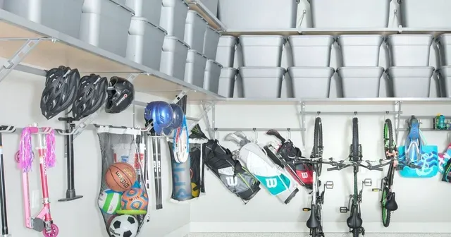 a garage filled with lots of toys and bicycles .