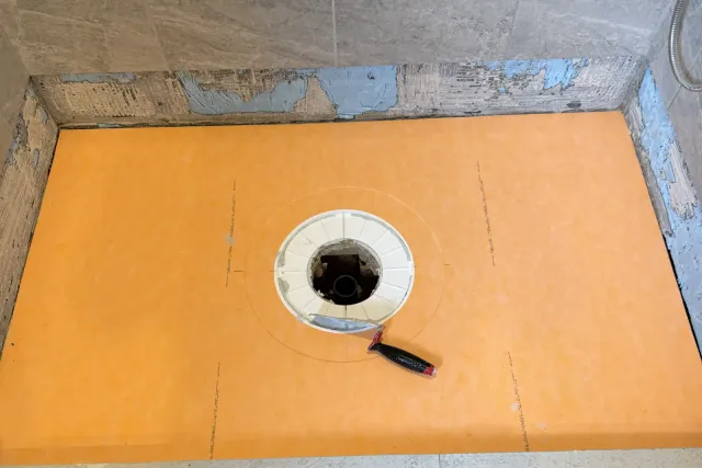 New Schluter-KERDI pre-sloped shower pan and drain bonded to the subfloor by Dmtilellc in Newington, CT