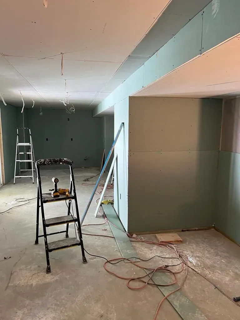 There is a ladder in the middle of the room.