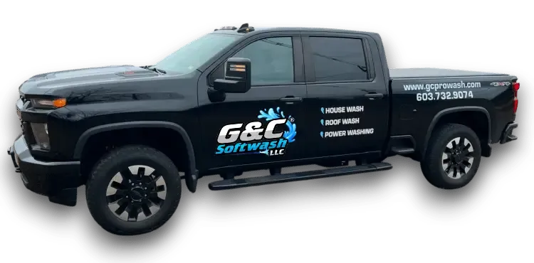 Black pickup with G&C Softwash LLC logo, water-splash graphic, services listed (House, Roof, Power wash), phone and website on bed.