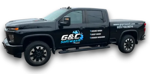 Black pickup with G&C Softwash LLC logo, water-splash graphic, services listed (House, Roof, Power wash), phone and website on bed.