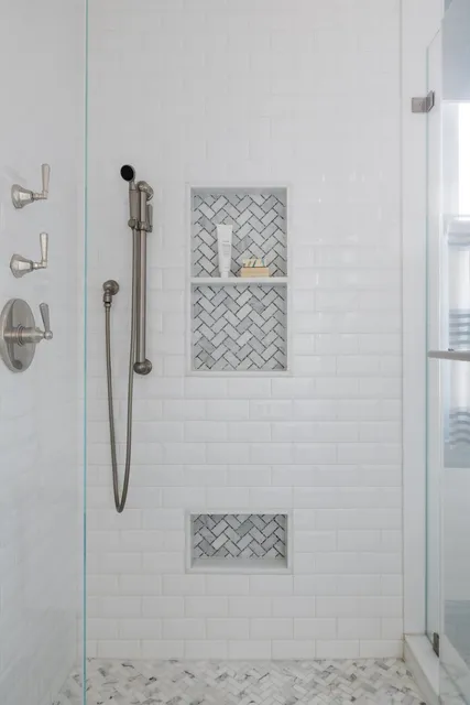 3x6 Beveled Subway Shower walls with marble mosaic niche details
