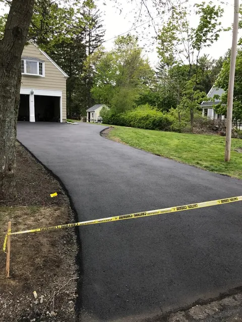 work photo from dmgtruckingpaving.com