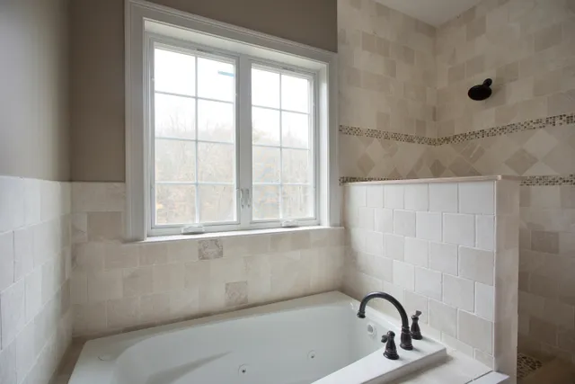 Finished bathroom with soaking tub