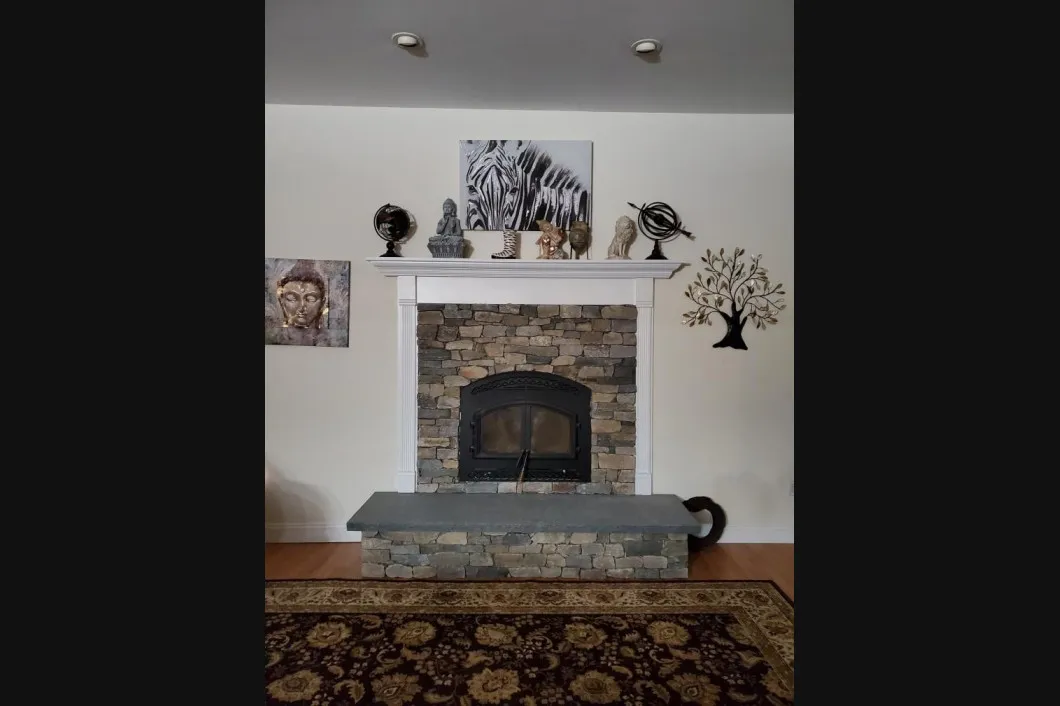 Rebuilt stone firebox face w/hearth