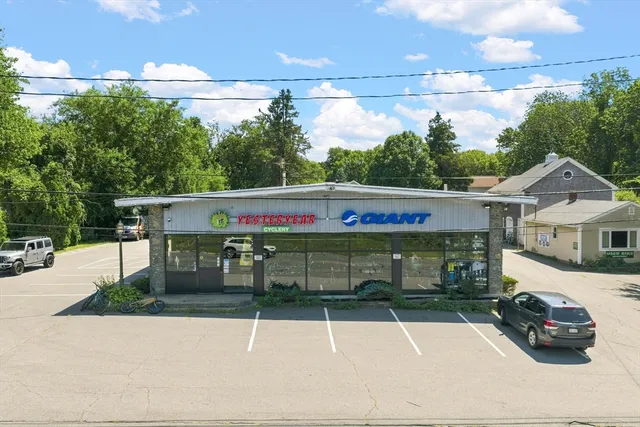 This is the first time this property has been offered for sale. Yesteryear Cyclery has been a staple at this site since 1974. The main retail building features 3,723 sq. ft. of street-level space and a 3,723 sq. ft. heated lower level. There is an additional office or small retail building providing 616 sq. ft. with a full basement. The property also includes a charming residential barn from 1840, which features a renovated one-bedroom apartment with a rear deck, as well as a barn offering versatile storage, garage, and workspace. This is a rare opportunity to acquire a highly visible location in an area where the city is planning a new office/industrial park at the nearby Whaling City Golf Club. The property benefits from exceptional exposure, with approximately 20,000 + cars passing by daily at the interchange.