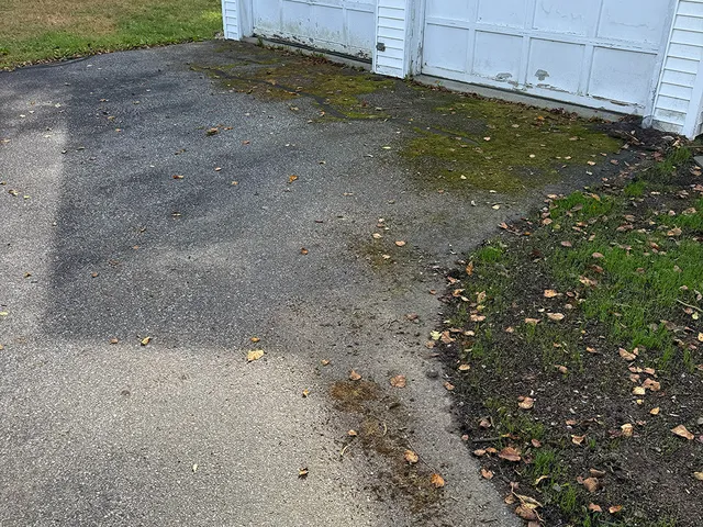 Driveway before pressure washing company came in Portland, Maine.