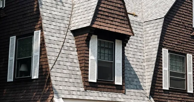 Completed roof replacement with wood gutter and fascia work