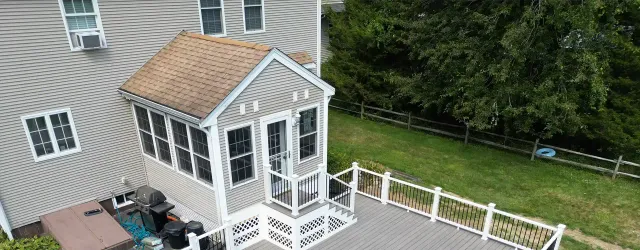 home with new deck and siding from absolute construction