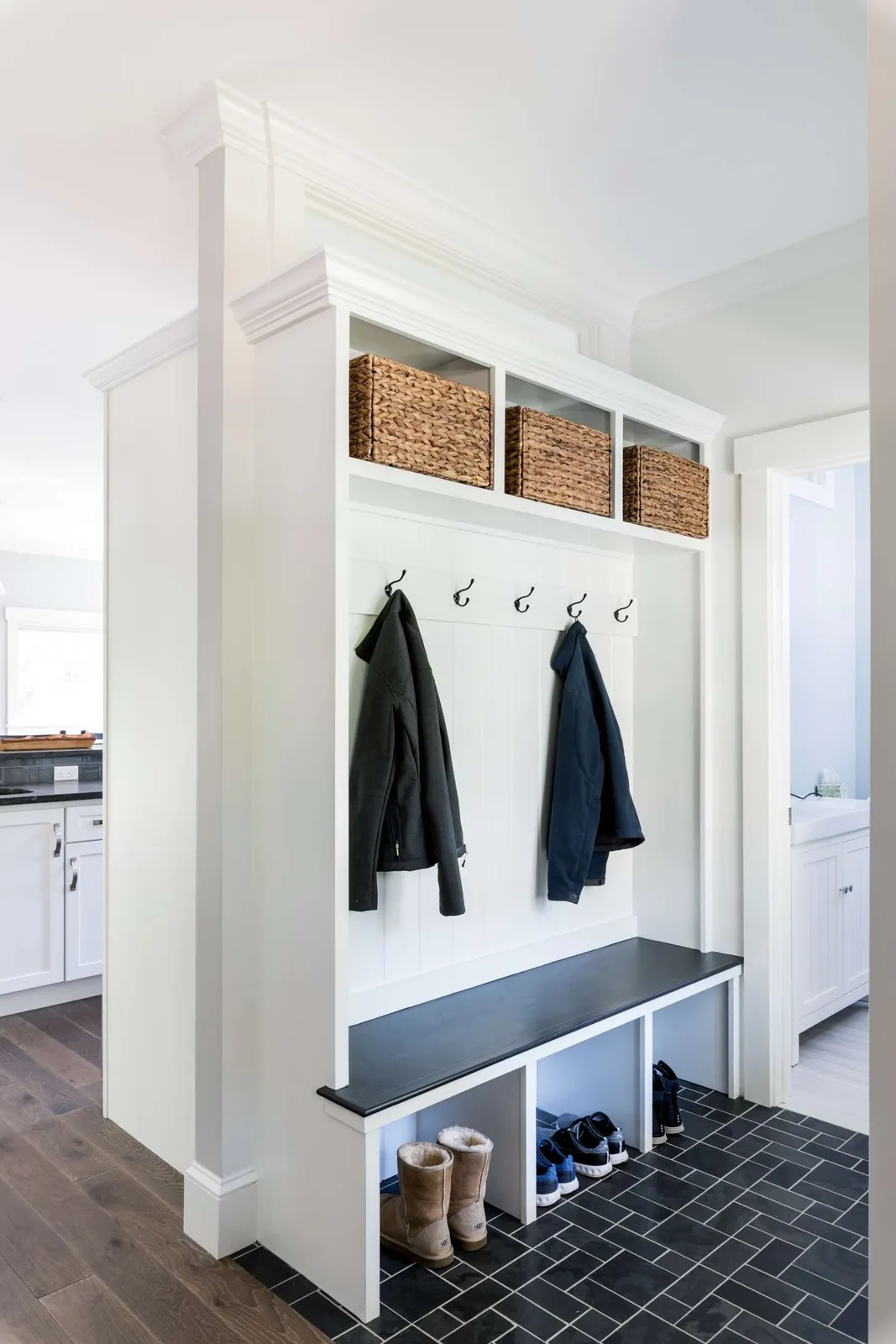 In Cape Cod homes, where footprints are often modest and storage is limited, every inch must earn its place.

Here, custom millwork turns overlooked space into architecture: a built-in bookcase conceals a passageway, while a tailored mudroom brings order to the demands of coastal living. Precise carpentry adds storage and function without compromising the character of the home.

The result is quiet, intentional design that proves more square footage isn’t always the answer. Often, it’s simply a matter of using the existing space with greater purpose.

#CapeCodHomes #CapeCodLiving #CapeCodDesign #CapeCodBuilder #CustomCarpentry #CustomMillwork #CapeAssociates