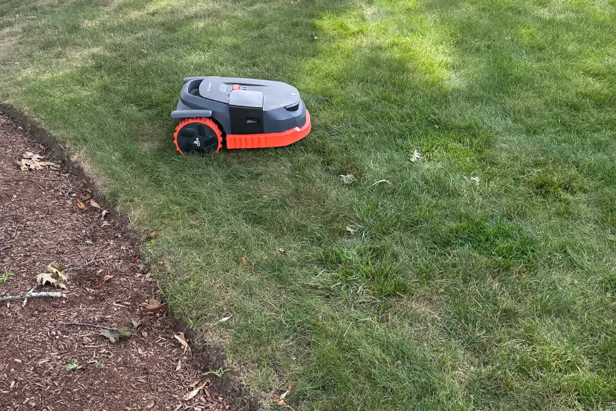 Molloy Landscape lawn mowing service using advanced equipment to keep residential grass healthy and neatly trimmed in Milton, MA.