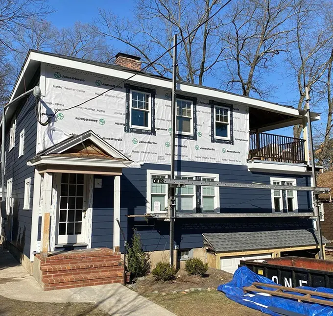 Newton Massachusetts home during siding and roof replacement