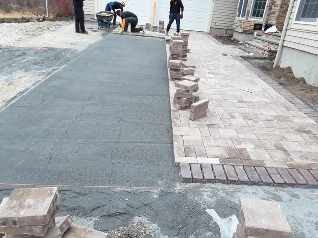 work photo from asphaltdrivewaysolutions.com