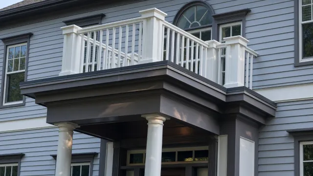 Deck with white railings and stairs built in Connecticut