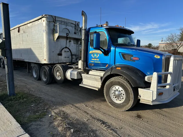 work photo from almightywaste.com