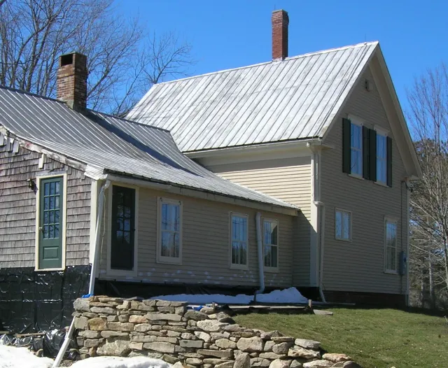 The rear of the home shown before improvements.