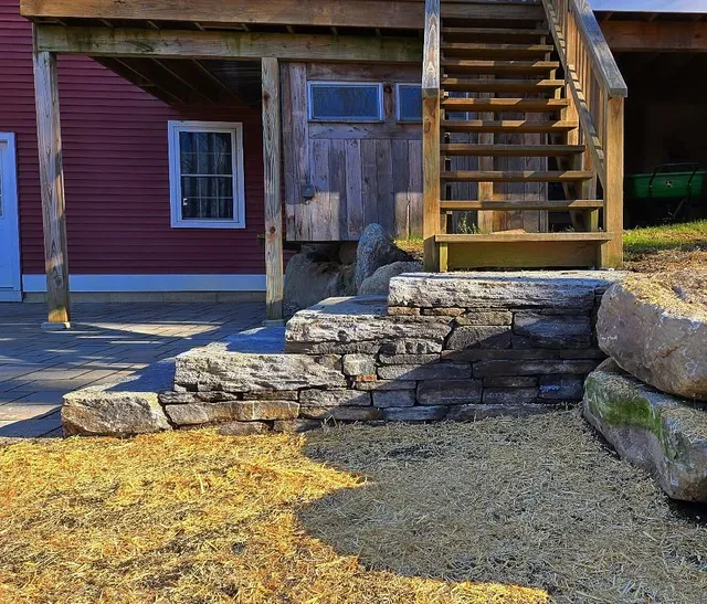 Tech block patio, Black river stone steps and boulder wall... 👌